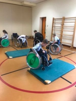 Workshop oefeningen in rolstoel