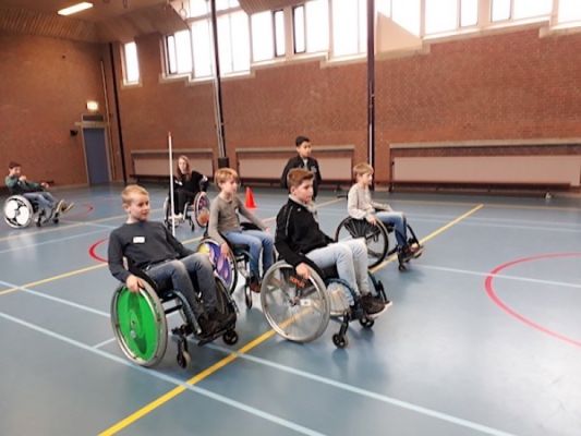 Workshop oefeningen in rolstoel