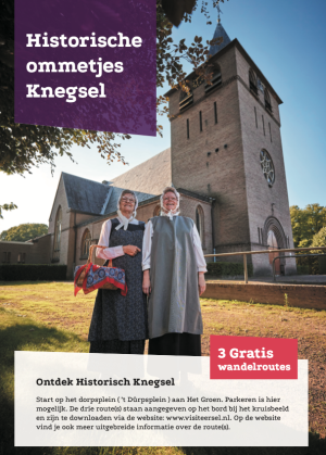 De kerk met pastorie in Knegsel met 2 dames in klederdracht